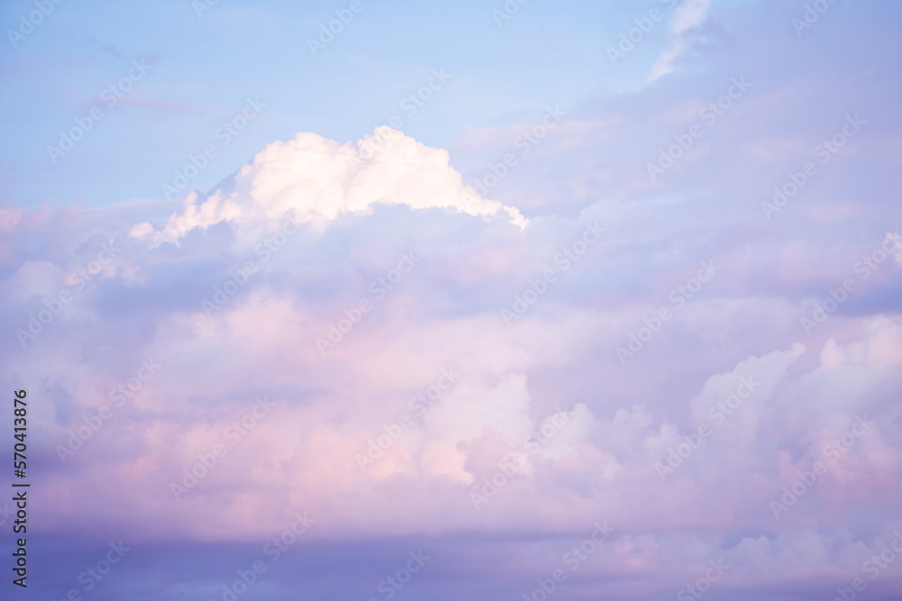 Sky with soft and fluffy pastel lilac pink and blue colored clouds. Sunset background. Nature. sunrise. Instagram toned style