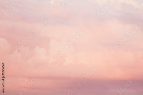 Sky with soft and fluffy pastel pink and blue colored clouds. Sunset background. Nature. sunrise. Instagram toned style