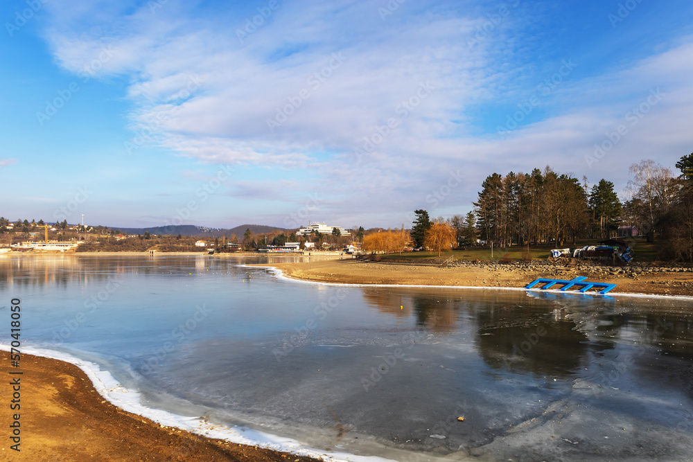 Winter landscape. Frozen water of the dam in the city of Brno - Czech Republic Europe.