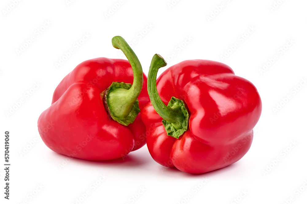Red ripe bell peppers, isolated on white background.