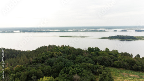 Beautiful natural scenery of the river and green forest, bird's eye view drone footage