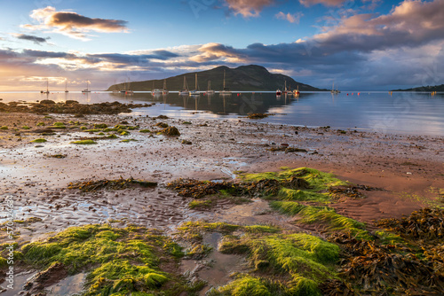 Holy Island from Lamlash on a beautiful calm summer morning on the Isle of Arran in Scotland. photo