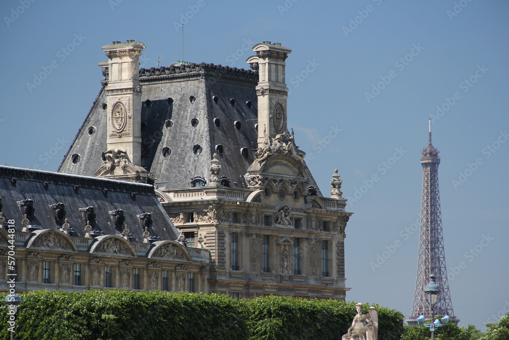 Paris view with louvre museum and eiffel tower and a beautiful blue sky