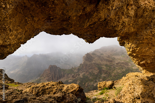 The Mystic View through Ventana del Nublo Rock Arch