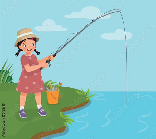Cute little girl fishing at the river holding a fishing rod