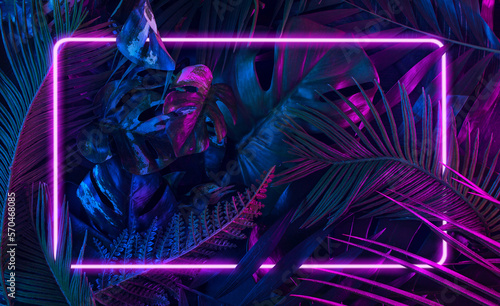 Fototapeta Naklejka Na Ścianę i Meble -  Trendy composition made of fluorescent color layout made of tropical jungle leaves. Flat lay neon colors. Nature concept. Creative art, minimal aesthetics.