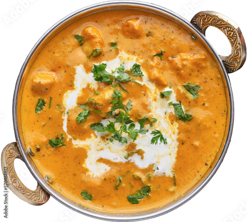 indian butter chicken curry in balti dish top down view and isolated with cream