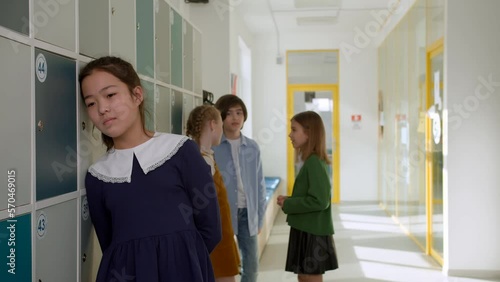 Elementary school class children communicate with the teacher answering question