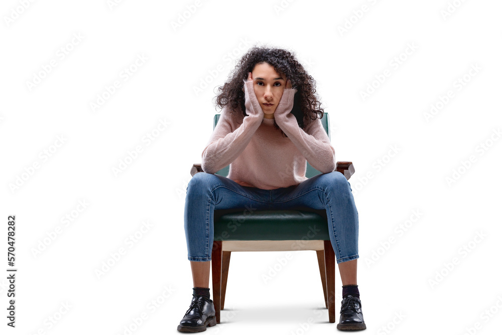 Young woman challenges in defiant pose, isolated.