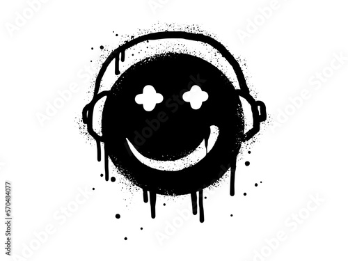 Smiling face emoticon character with headphone. Spray painted graffiti smile face in black over white. isolated on white background. vector illustration