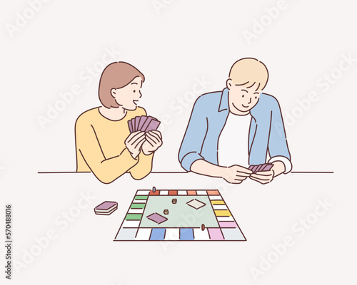 Couple Playing Board Game. Hand drawn style vector design illustrations.