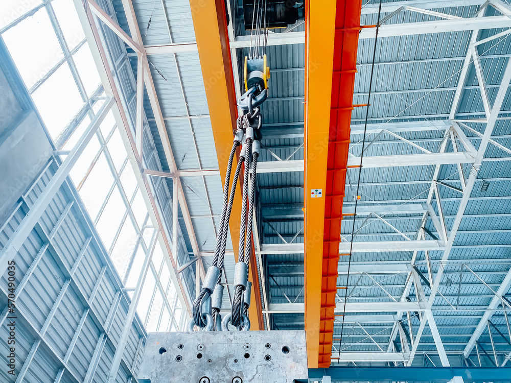 Overhead crane inside factory building, industrial background. Overhead crane inside factory building, industrial background.