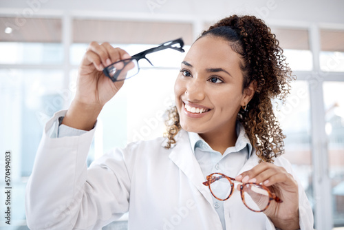 Eye care, vision and black woman, glasses choice and optometrist, healthcare for eyes with doctor and smile. Prescription lens, designer frame and eyewear decision, health insurance and optometry