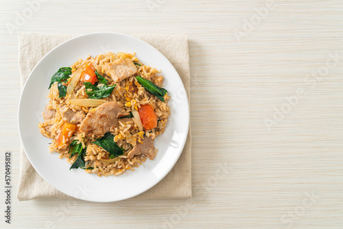 Fried rice with pork on plate