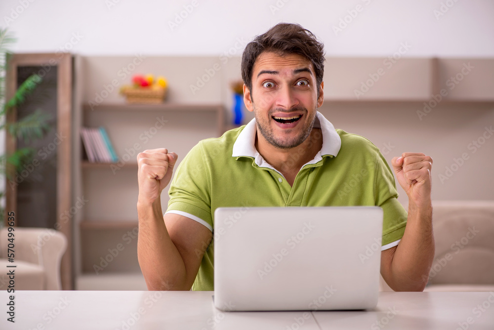 Young man working from home during pandemic Young man working from home during pandemic
