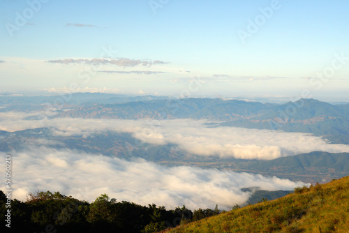 Landscape nature morning view with fog around mountain valley in Kew Mae Pan nature trail in Chiang mai Thailand of Doi Inthanon National Park. 3 km hiking trail. Experience rainforest, grasslands