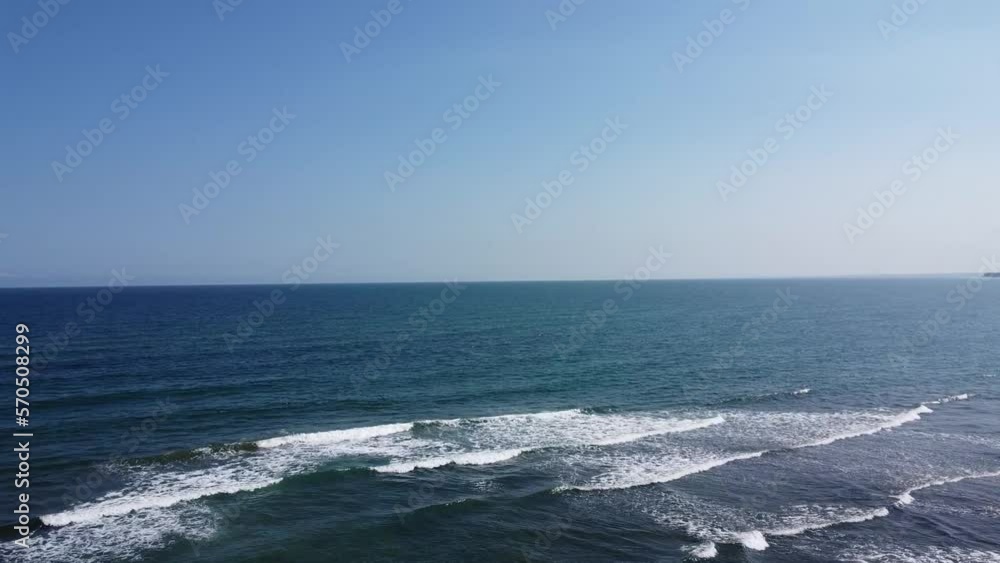 Drone shot of a beautiful sunny day in the coast of Mexico, Mexican beach place, latinoamerican nature, sea with waves and sand Drone shot of a beautiful sunny day in the coast of Mexico, Mexican beach place, latinoamerican nature, sea with waves and sand