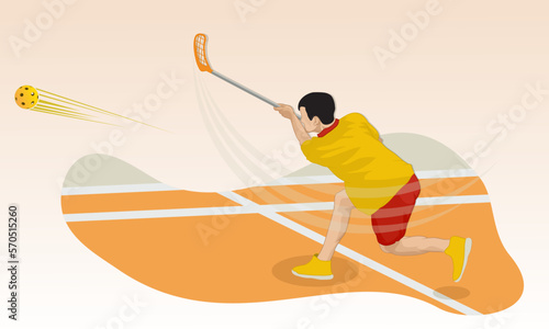 Fotografie A young athlete in the game of floorball makes a hit with a sports stick on the ball