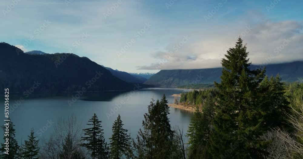 Fly out over Lake Cushman from the overlook. Beautiful forestand lake views with mountains Fly out over Lake Cushman from the overlook. Beautiful forestand lake views with mountains