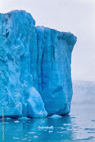 Glacier serac by the sea in the Arctic