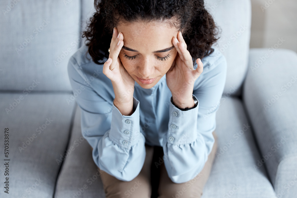 Headache, stress and anxiety with black woman on sofa for burnout, mental health and sad. Depression, thinking and frustrated with girl in living room suffering with problem, worried and exhausted Headache, stress and anxiety with black woman on sofa for burnout, mental health and sad. Depression, thinking and frustrated with girl in living room suffering with problem, worried and exhausted