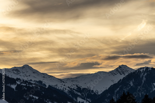 Sunrise over snow covered mountains in the Austrian Alps - Kitzbühel, Tirol 