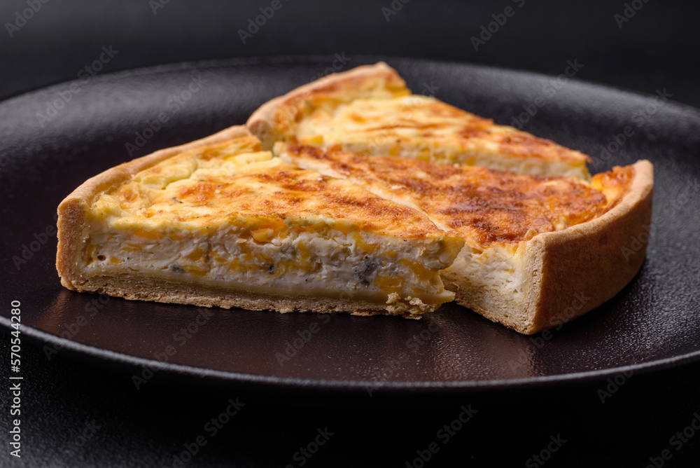 Beautiful delicious quiche pie with four types of cheese with spices and herbs