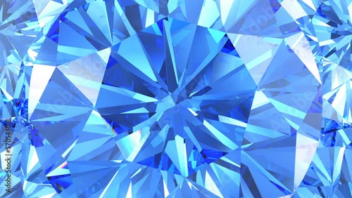 Beautiful shiny sapphire crystal. Kaleidoscope, rotating background, looping animation photo