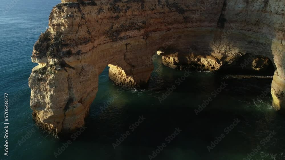 Praia da Marinha from aerial view at sunrise Praia da Marinha from aerial view at sunrise