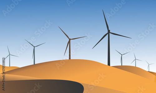 Wind turbines in the desert. Concept of obtaining clean electric energy from renewable sources with sand dunes.