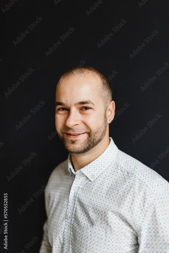 portrait of a thirty-year-old businessman in jeans and a shirt portrait of a thirty-year-old businessman in jeans and a shirt