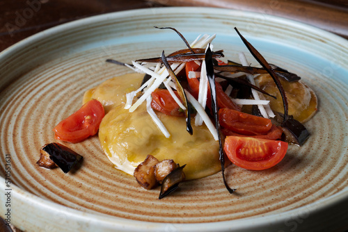 Ravioli con melanzane e pomodorini photo