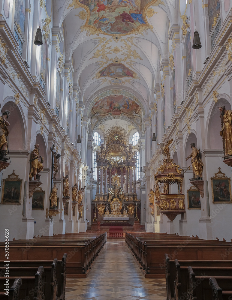 Obraz premium Magnificent opulent splendid Bavarian baroque church cathedral basilica interiors with stucco, murals, altar, Pilars, ceiling paintings, gold, wood domes nave