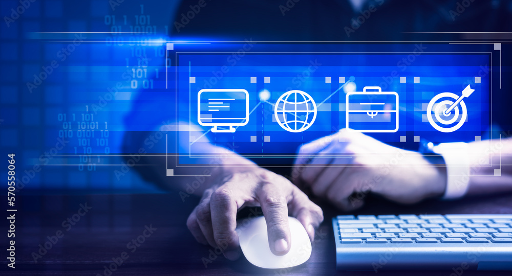 Businessman analyze business data on virtual screen with icons for strategy, vision, plan and management Businessman analyze business data on virtual screen with icons for strategy, vision, plan and management