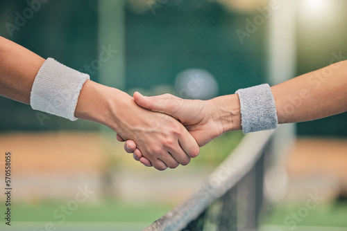 Hand, tennis and handshake for partnership, unity or greeting in sportsmanship at the outdoor court. Players shaking hands before sports game, match or trust for deal or agreement in solidarity photo