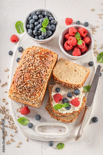 Tasty and fresh bread with berries and cottage cheese.