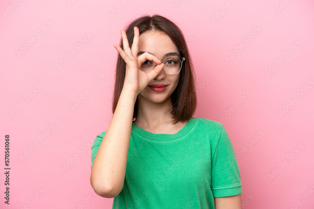 Young Ukrainian woman isolated on pink background With glasses with happy expression Young Ukrainian woman isolated on pink background With glasses with happy expression