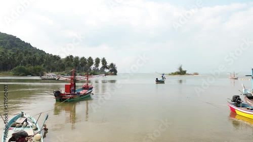 frying over boats on the river