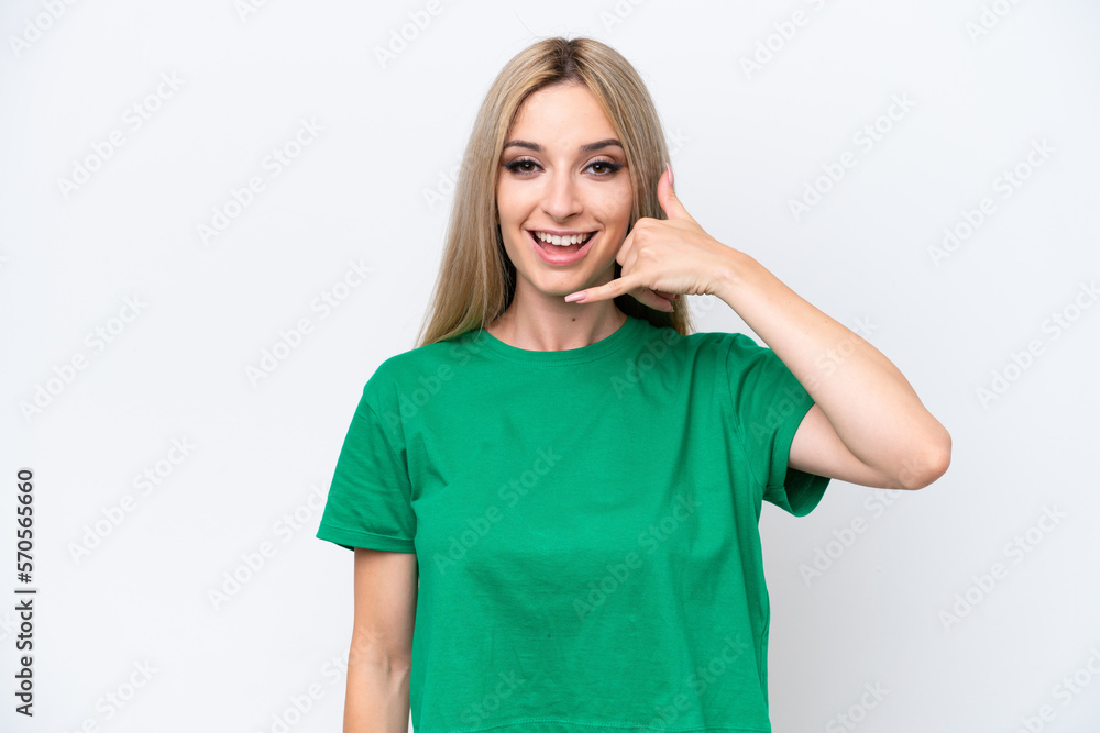 Pretty blonde woman isolated on white background making phone gesture. Call me back sign Pretty blonde woman isolated on white background making phone gesture. Call me back sign