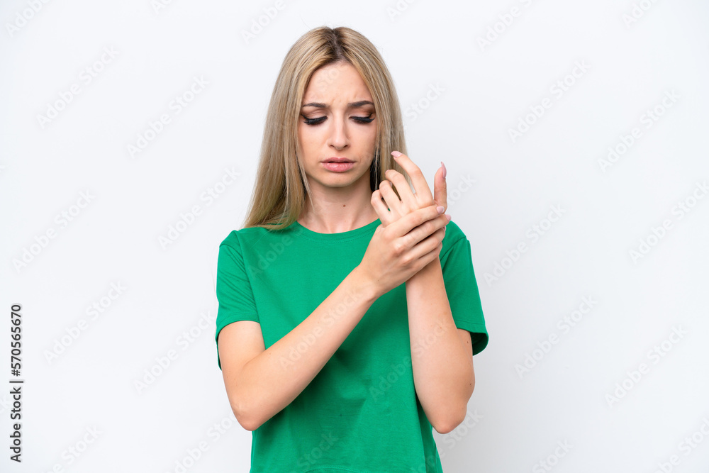 Pretty blonde woman isolated on white background suffering from pain in hands Pretty blonde woman isolated on white background suffering from pain in hands