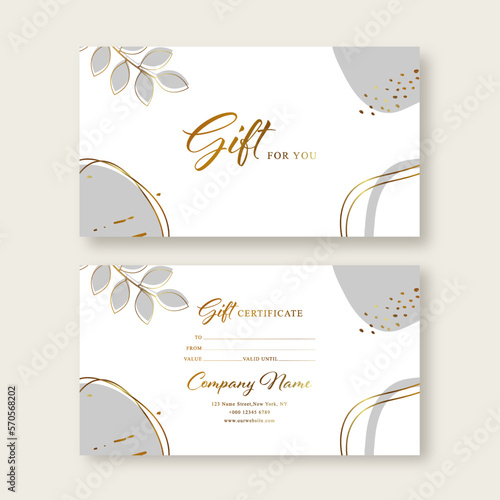 Gift voucher card template. Modern discount coupon or certificate layout with abstract golden art backgrounds and botanical palm leaves Vector illustration.