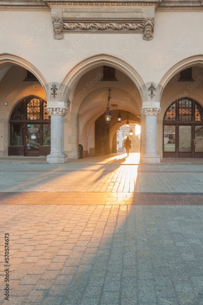 Poland, Kraków, Sukiennice Cloth Hall, passageway seen against daylight in the morning