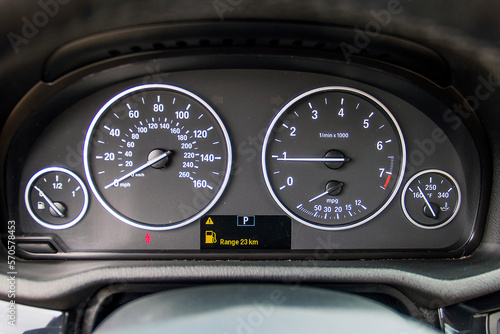 Close-up of speed and distance indicators in the car and indicators of the level of gasoline and other indicators 