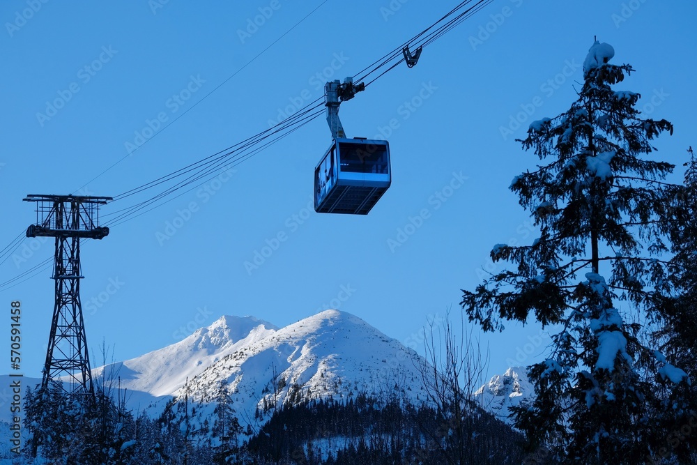 Ropeway to Kasprowy Wierch Peak in Tatras Mountains in beautiful winter scenery in morning light, famous place in Tatras, Poland. Tatra National Park Ropeway to Kasprowy Wierch Peak in Tatras Mountains in beautiful winter scenery in morning light, famous place in Tatras, Poland. Tatra National Park