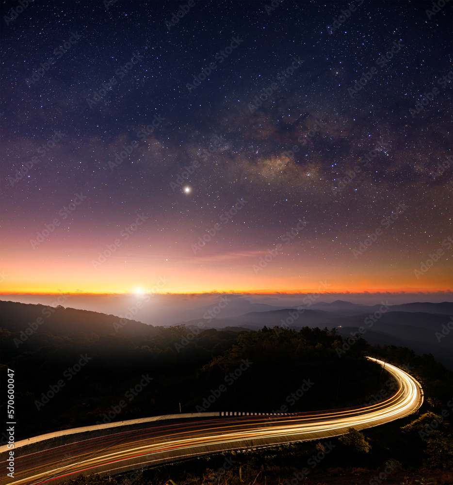 landscape view point asphalt curved road on Doi Inthanon National park mountains at dawn with milky way background.