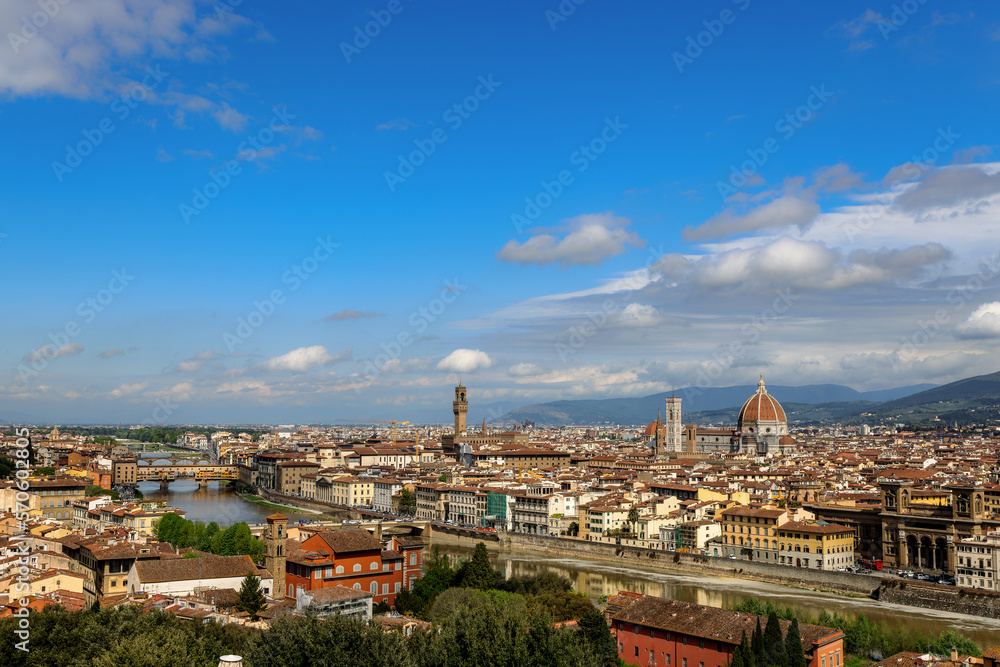 View over the Arno river, the Palazzo Vecchio and the Florence Cathedral in Florence, Tuscany, Italy, on a sunny day in spring.