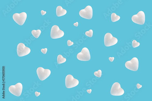 White heart shapes on pastel blue background