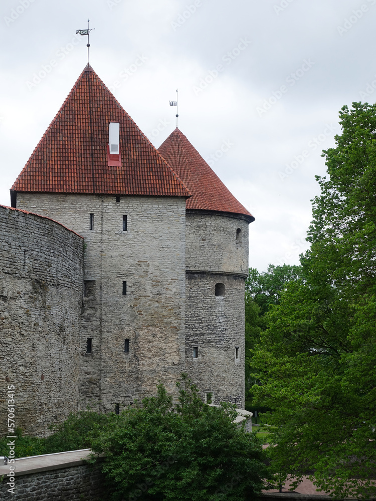 Tallinn, Estonia, 26_05_2019 - Towers of the old town wall with pointed roofs