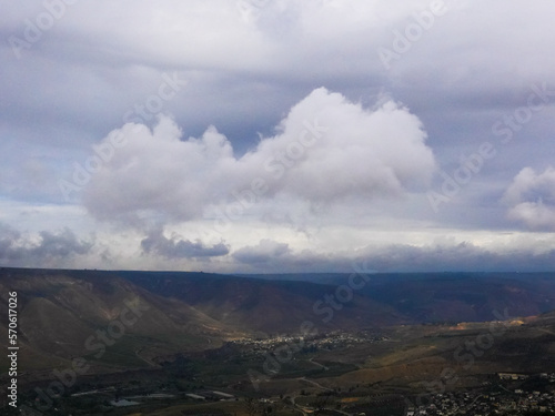 umm qais - irbid, jordan 06- Feb- 2023 - cloud layers and green mountains