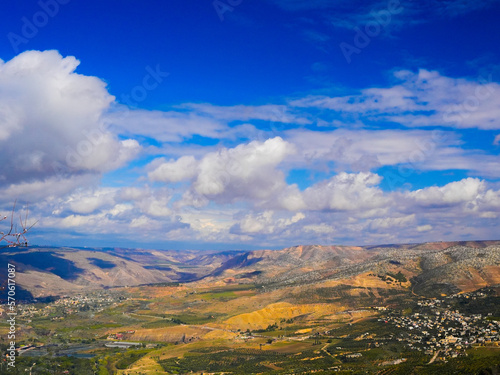 umm qais - irbid, jordan 06- Feb- 2023 
 - View of the city of Tiberias and The Sea of Galilee in Israel with blue sky and light clouds